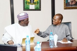 Mounir Gwarzo D.G SEC Nigeria and Abraham Nwankwo, D.G DMO at the meeting on Tuesday in Abuja Nigeria-Credit SEC
