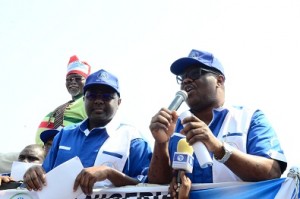 Left to right: Mounir Gwarzo, DG SEC and Zakawanu Garuba, Executive Commissioner Corporate Services SEC on a Road Show to Nyanyan market in Abuja, to sensitize investors on the e-Dividend Registration,Wednesday