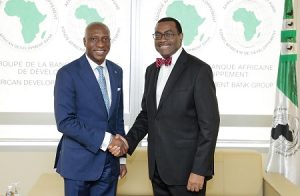 L – R shows Oscar N. Onyema, OON, President,  African Securities Exchanges Association (ASEA) and CEO, The Nigerian Stock Exchange (NSE) and Dr. Akinwumi Adesina, President, African Development Bank (AfDB)  at the signing of MoU between AfDB and ASEA in Abidjan.