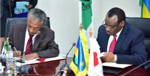 Claver Gatete (right), Minister of Finance and Economic planning, and Makonnen Negatu (left) Bank’s resident representative in Rwanda, at the signing ceremony of loan agreement of the Regional Kagitumba Kayonza Rusumo Road Project. Credit AfDB