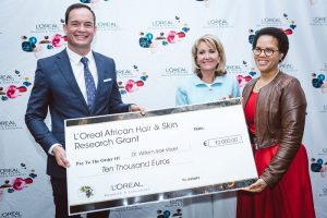 From Left: Dr Willem Visser, Head of Dermatology University of Stellenbosch L’Oreal African Hair & Skin Research Grant recipient ; Dr Michele Verschoore, Medical Director, L’Oreal Research & Innovation; Professor Ncoza Dlova University of Kwa-Zulu Natal