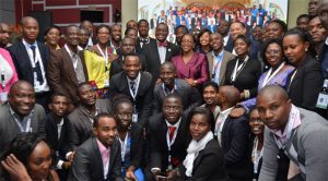 President Adesina poses for a photo with youth during the Africa Youth Entrepreneurship Forum at TICAD VI.