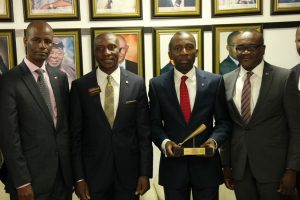 L – R : Auwalu Babura, ED, Finance & Admin,  Red Star Express Plc; Oscar  Onyema, CEO, NSE; Sola Obabori, MD/CEO, Red Star Express Plc and Victor Ukwat, ED, Sales & Marketing, Red Star Express Plc at the Closing Gong Ceremony at the NSE on Monday. 