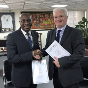 L – R shows Oscar Onyema, President African Securities Exchanges Association (ASEA)  & CEO NSE with Kevin Moore, Director Global Business Development, Chartered Institute for Securities & Investment (CISI) at the signing of an MoU between CISI and ASEA to jointly develop a common certification programme across ASEA Member Exchanges.