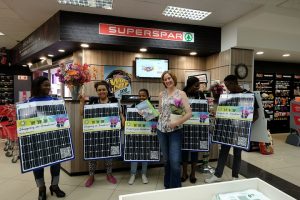 Greenpeace activists displaying shopping on sunshine placards at Spar. Photo credits to Greenpeace/ Shayne Robinson