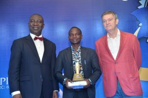 From Left to Right: Deputy Senate President, Ike Ekweremadu; Gbenga Salau, first runner-up, NB Golden Pen Reporter of the Year and  Nicolaas Velverde, Managing Director, Nigerian Breweries at the Golden Pen Award night in Lagos on Friday