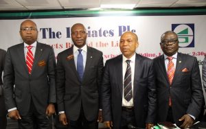 L – R: shows Haruna Jalo-Waziri, ED, Capital Markets Division, NSE; Oscar Onyema, CEO, NSE; Ossai Reuben Mustapha, MD/CEO; Joseph Ogbonna Anosike, Chairman, The Initiates Plc at listing of The Initiates Plc at the Exchange on Tuesday. 