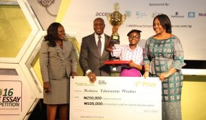 L – R: Shows Ope Wemi-Jones, Head, Inclusive Banking, Access Bank Plc; Oscar Onyema,CEO NSE; Miss Ifeoluwa Toluwanimi Abiodun, 1st Price Winner, 2016 NSE Essay Competition and Ms. Chinelo Anohu-Amazu, DG PENCOM at the 2016 NSE Essay Competition Awards Ceremony, at the Civic Centre, Victoria Island, Lagos on Thursday.