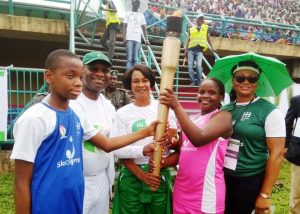L-R: Director-General of School Sports, Lagos State Sport Commission, Mr. Moses Kolawole; Managing Director/CEO, Heritage Bank, Ifie Sekibo; Heritage Bank-Lagos State Skoolimpics Torch Bearer, Momore Opawole; Heritage Bank-Lagos State Skoolimpics Ambassador, Mary Onyali; Torch Bearer, Favour Ojo and Representative of Lagos State Commissioner for Sports and Director General, School Sports, Lagos State Sports Commission, Dewunmi Ogunsanya, during the opening ceremony of Skoolimpics at the Teslim Balogun Stadium, in Lagos …yesterday. 
