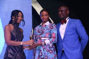 Thelma Chukwu of Nestoil presenting award for best company in CSR Sustainability, West Africa to Ijeoma Aso, Managing Director, UBA Foundation while Olusegun Fafore, Corporate Communications Manager, Nest Oil, looks on...at the 2016 SERAS CSR Awards -Africa in Lagos, during the weekend.