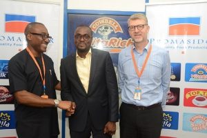 (L-R) Andrew Enahoro, Head, Legal/Public Relations, Promasidor Nigeria; Olatunji Ololade, first runner-up, 2016 Promasidor Quill Awards; and Olivier Thiry, Managing Director, Promasidor Nigeria Limited; during Ololade’s visit to Thiry in his office in Isolo, Lagos…on Thursday