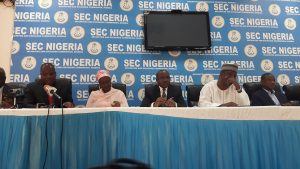 Mounir Gwarzo, Director General, Securities and Exchange Commission (SEC) and his team briefing the press on Friday. Photo Credit: InvestAdvocate