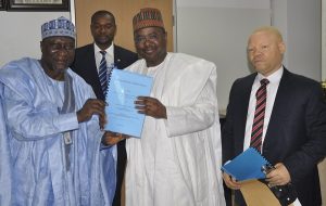 L-R, Ismail Junaidu, Executive Secretary, Nigerian > Educational Research and Development Council (NERDC), Victor Odoeme, > Head Legal NERDC, Mounir Gwarzo, DG SEC and Reginald Karawusa, Acting > Secteary SEC during the signing of Memorandum of Understanding between SEC > and NERDC, on introduction of Capital Market Studies (CMS) in Schools > Curriculum held in Abuja last Friday.