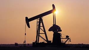 U.S. oil hits one-week high as dollar sags; many Asian markets shut